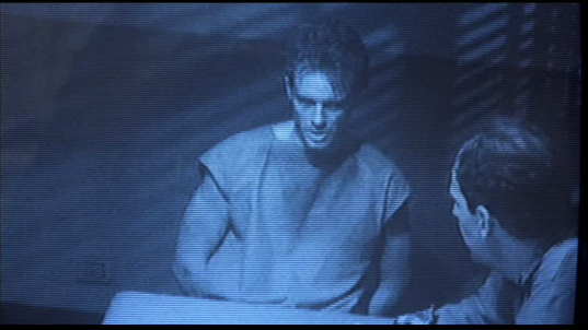 Scene from James Cameron's "The Terminator" - Reese's Interrogat